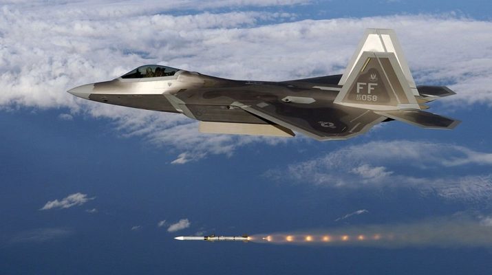 F-22A Raptor #03-4058 from the 27th Fighter Squadron "Fighting Eagles" located at Langley Air Force Base, Virginia, fires an AIM-120 Advanced Medium Range Air-to-Air Missile (AMRAAM)