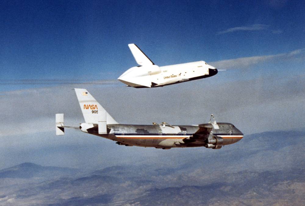 The Space Shuttle prototype Enterprise flies free of NASA's 747 Shuttle Carrier Aircraft (SCA) 905 during one of five free flights carried out at the Dryden Flight Research Facility, Edwards, Calif., in 1977