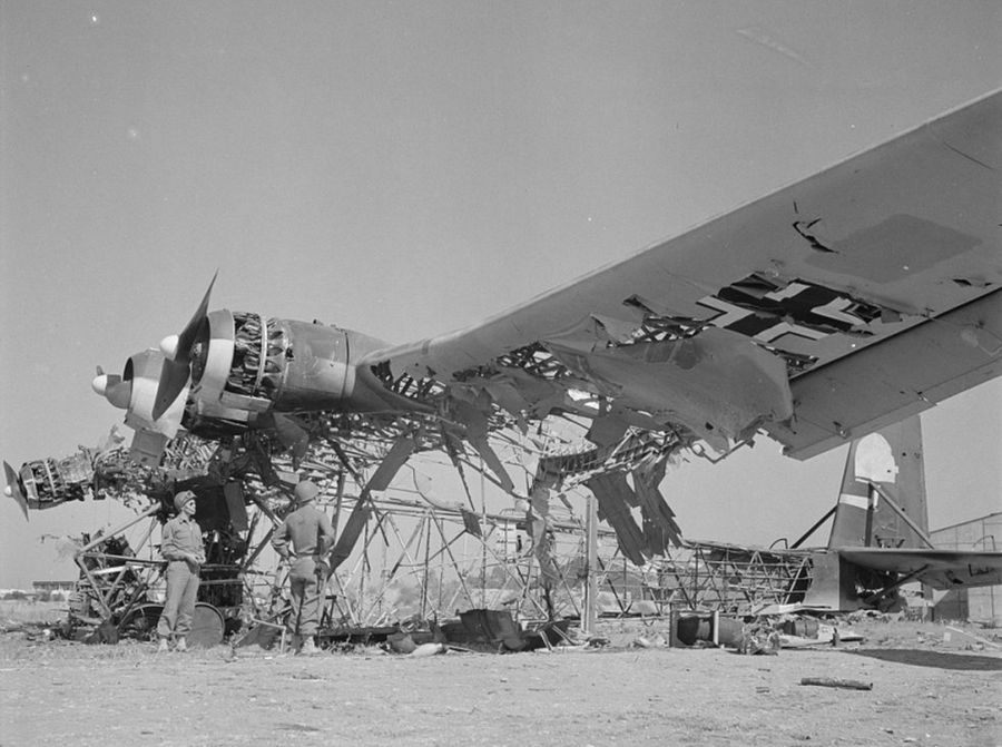 A wrecked German Messerschmitt Me 323D-1/-2 Gigant transport at El Aouiana airport, Tunis, Tunisia, in May 1943. Note that the D-1/D-2 variants had Gnome-Rhone 14M engines with a wooden 2-bladed propeller.